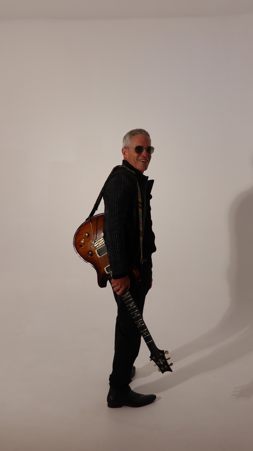 Groove Dr B guitar and official merchandise lifestyle shot